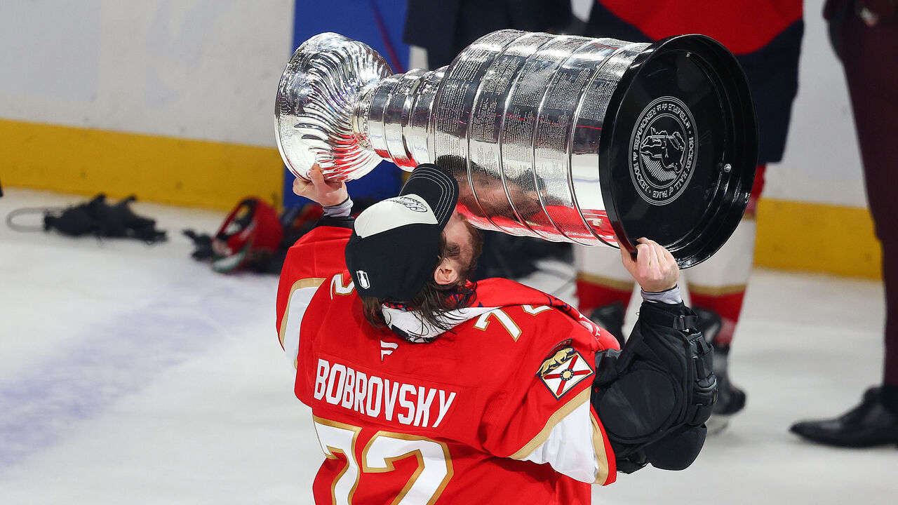 SUNRISE, FLORIDA - JUNE 17: Sergei Bobrovsky #72 of the Florida Panthers celebrates with the Stanley Cup after defeating the Edmonton Oilers in Game Six of the 2025 Stanley Cup Final at Amerant Bank Arena on June 17, 2025 in Sunrise, Florida.