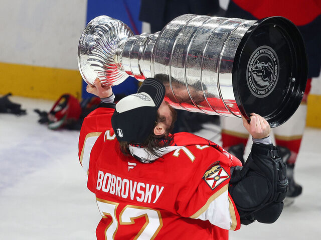 SUNRISE, FLORIDA - JUNE 17: Sergei Bobrovsky #72 of the Florida Panthers celebrates with the Stanley Cup after defeating the Edmonton Oilers in Game Six of the 2025 Stanley Cup Final at Amerant Bank Arena on June 17, 2025 in Sunrise, Florida.