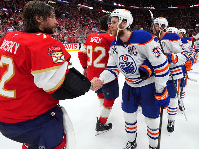 SUNRISE, FLORIDA - JUNE 17: Sergei Bobrovsky #72 of the Florida Panthers and Connor McDavid #97 of the Edmonton Oilers shake hands after Game Six of the 2025 Stanley Cup Final between the Edmonton Oilers and the Florida Panthers at Amerant Bank Arena on June 17, 2025 in Sunrise, Florida. The Panthers won the Stanley Cup Final series 4-2.
