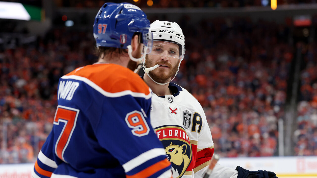 EDMONTON, CANADA - JUNE 06: Connor McDavid #97 of the Edmonton Oilers and Matthew Tkachuk #19 of the Florida Panthers during the third period in Game Two of the 2025 Stanley Cup Final at Rogers Place on June 06, 2025 in Edmonton, Alberta, Canada.