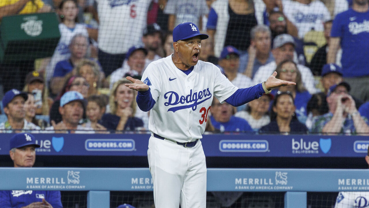 LOS ANGELES, CA - JUNE 17, 2025: Dodgers manager runs onto the field to complain after Los Angeles Dodgers Shohei Ohtani (17) was hit by a pitch and umpires issued a warning to both teams in the third inning at Dodger Stadium on June 17, 2025 in Los Angeles, California. Roberts was ejected.(Gina Ferazzi / Los Angeles Times via Getty Images)
