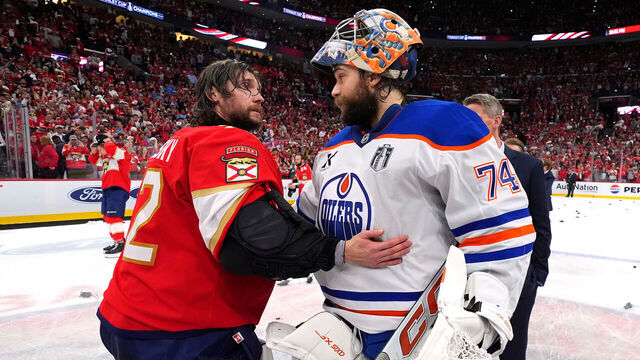 SUNRISE, FLORIDA - JUNE 17: Sergei Bobrovsky #72 of the Florida Panthers and Stuart Skinner #74 of the Edmonton Oilers talk at the handshake line after Game Six of the 2025 Stanley Cup Final between the Edmonton Oilers and the Florida Panthers at Amerant Bank Arena on June 17, 2025 in Sunrise, Florida. The Panthers won the Stanley Cup Final series 4-2.