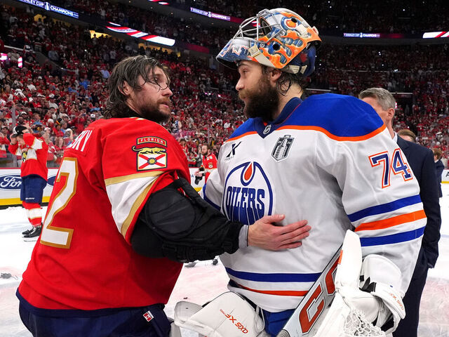SUNRISE, FLORIDA - JUNE 17: Sergei Bobrovsky #72 of the Florida Panthers and Stuart Skinner #74 of the Edmonton Oilers talk at the handshake line after Game Six of the 2025 Stanley Cup Final between the Edmonton Oilers and the Florida Panthers at Amerant Bank Arena on June 17, 2025 in Sunrise, Florida. The Panthers won the Stanley Cup Final series 4-2.