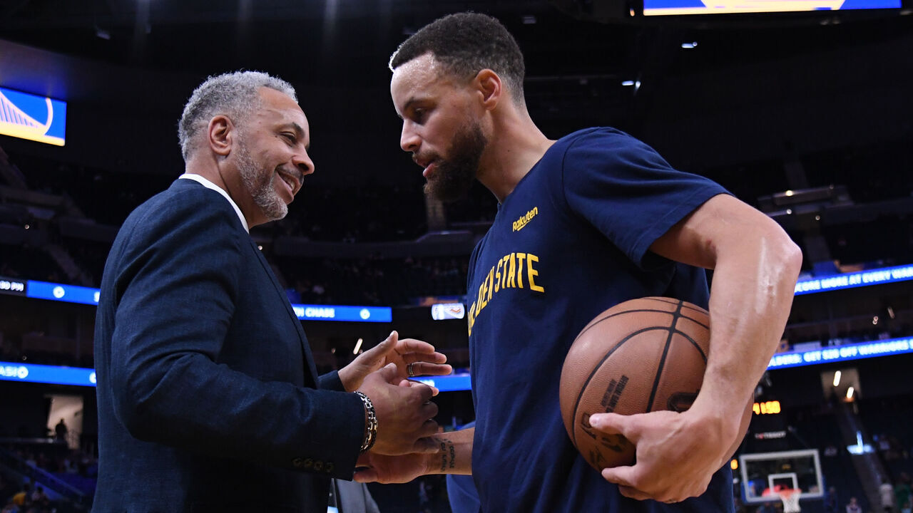 SAN FRANCISCO, CA - FEBRUARY 23: Stephen Curry #30 of the Golden State Warriors talks to Dell Curry before the game against the Charlotte Hornets on February 23, 2024 at Chase Center in San Francisco, California. NOTE TO USER: User expressly acknowledges and agrees that, by downloading and or using this photograph, user is consenting to the terms and conditions of Getty Images License Agreement. Mandatory Copyright Notice: Copyright 2024 NBAE