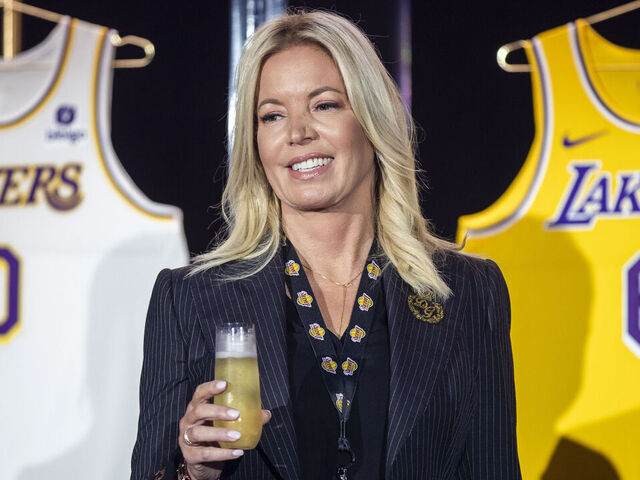 EL SEGUNDO, CA - September 20: Jeanie Buss, CEO / Governor / Co-owner of the Los Angeles Lakers, holds a new Lakers jersey as the Lakers host a 2021-2022 season kick-off event to unveil and announce a new global marketing partnership with Bibigo, which will appear on the Lakers jersey at the UCLA Health Training Center in El Segundo on Monday, Sept. 20, 2021. (Allen J. Schaben / Los Angeles Times via Getty Images)