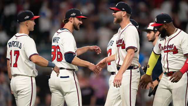 ATLANTA, GA - JUNE 18: Stuart Fairchild #17, Eli White #36 and Chris Sale #51 of Atlanta Braves celebrate after winning the game between the New York Mets and the Atlanta Braves at Truist Park on Wednesday, June 18, 2025 in Atlanta, Georgia.