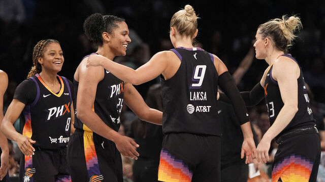 NEW YORK, NEW YORK - JUNE 19: From left, Monique Akoa Makani #8, Alyssa Thomas #25, Kitija Laksa #9, and Sami Whitcomb #33 of the Phoenix Mercury react after defeating the New York Liberty 89-81 at Barclays Center on June 19, 2025 in New York City.