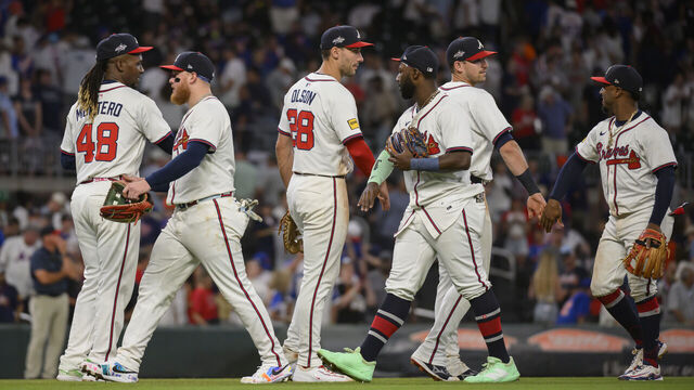 ATLANTA, GEORGIA - JUNE 19: Rafael Montero #48 (left), Alex Verdugo #8, Matt Olson #28, Michael Harris II #23, Austin Riley #27, and Ozzie Albies #1 of the Atlanta Braves celebrate after winning a game against the New York Mets at Truist Park on June 19, 2025 in Atlanta, Georgia.