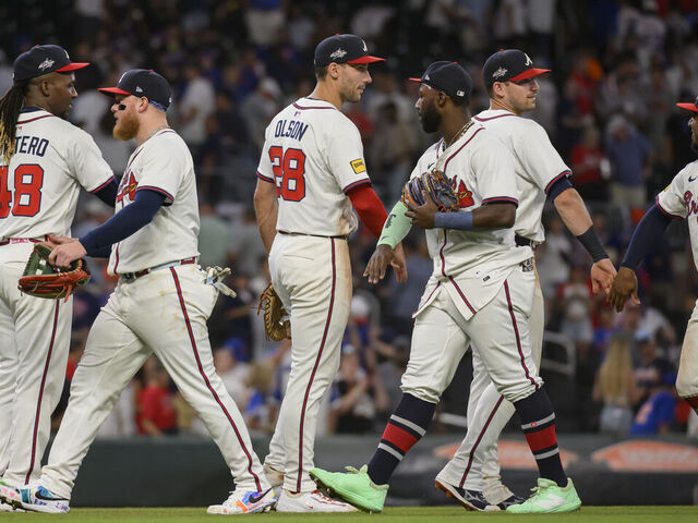 ATLANTA, GEORGIA - JUNE 19: Rafael Montero #48 (left), Alex Verdugo #8, Matt Olson #28, Michael Harris II #23, Austin Riley #27, and Ozzie Albies #1 of the Atlanta Braves celebrate after winning a game against the New York Mets at Truist Park on June 19, 2025 in Atlanta, Georgia.