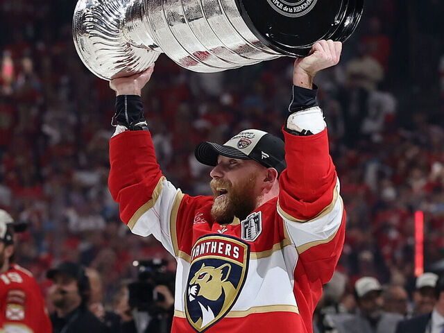 SUNRISE, FLORIDA - JUNE 17: Sam Bennett #9 of the Florida Panthers celebrates with the Stanley Cup after winning in Game Six of the 2025 Stanley Cup Finals at Amerant Bank Arena on June 17, 2025 in Sunrise, Florida. The Panthers defeated the Oilers 5-1 to win the Stanley Cup Finals.