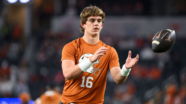 ARLINGTON, TEXAS - JANUARY 10: Arch Manning #16 of the Texas Longhorns warms up before the Goodyear Cotton Bowl at AT&T Stadium on January 10, 2025 in Arlington, Texas.