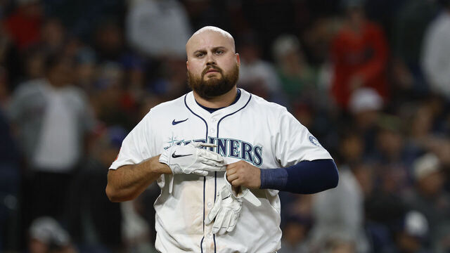 SEATTLE, WASHINGTON - JUNE 14: Rowdy Tellez #23 of the Seattle Mariners removes his batting gloves during the game against the Cleveland Guardians at T-Mobile Park on June 14, 2025 in Seattle, Washington. The Seattle Mariners win 4-3.