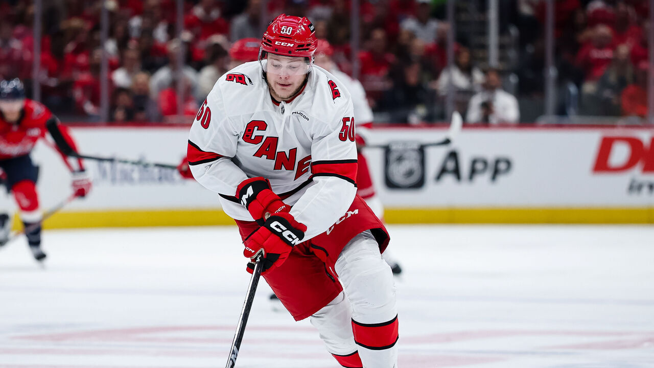 WASHINGTON, DC - MAY 08: Eric Robinson #50 of the Carolina Hurricanes skates with the puck against the Washington Capitals during the first period in Game Two of the Second Round of the 2025 Stanley Cup Playoffs at Capital One Arena on May 8, 2025 in Washington, DC.