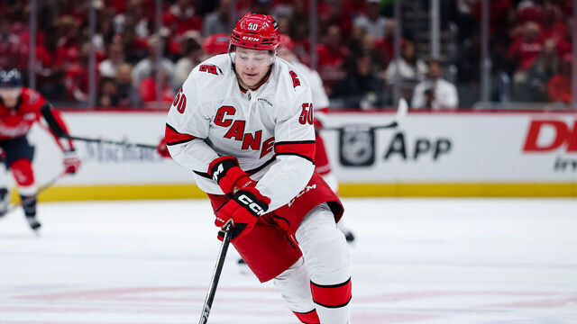 WASHINGTON, DC - MAY 08: Eric Robinson #50 of the Carolina Hurricanes skates with the puck against the Washington Capitals during the first period in Game Two of the Second Round of the 2025 Stanley Cup Playoffs at Capital One Arena on May 8, 2025 in Washington, DC.