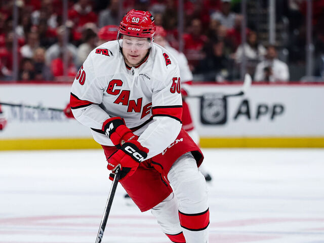 WASHINGTON, DC - MAY 08: Eric Robinson #50 of the Carolina Hurricanes skates with the puck against the Washington Capitals during the first period in Game Two of the Second Round of the 2025 Stanley Cup Playoffs at Capital One Arena on May 8, 2025 in Washington, DC.