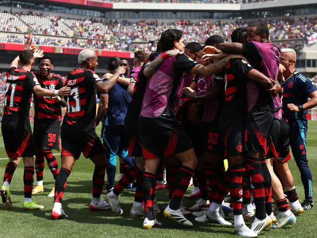 Flamengo's Brazilian forward #27 Bruno Henrique (unseen) celebrates with a teammates after scoring his team's first goal during the FIFA Club World Cup 2025 Group D football match between Brazil's CR Flamengo and England's Chelsea at the Lincoln Financial Field stadium in Philadelphia on June 20, 2025.
