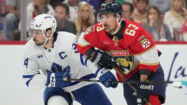 SUNRISE, FL - MAY 11: Florida Panthers center Brad Marchand (63) and Toronto Maple Leafs center Auston Matthews (34) move toward the puck in the second period during game four of the Stanley Cup Playoffs 2nd Round between the Toronto Maple Leafs and the Florida Panthers on Sunday, May 11, 2025 at Amerant Bank Arena in Sunrise, FL.