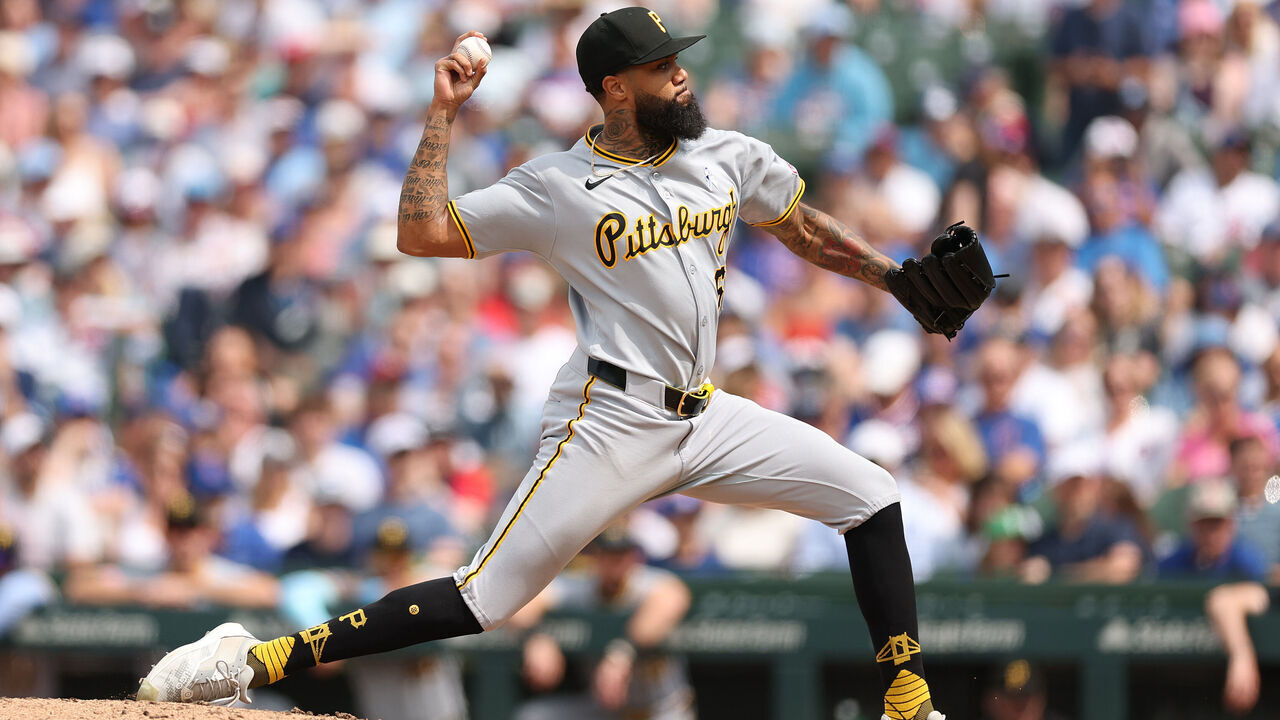 CHICAGO, ILLINOIS - JUNE 15: Dennis Santana #60 of the Pittsburgh Pirates delivers a pitch during the ninth inning against the Chicago Cubs at Wrigley Field on June 15, 2025 in Chicago, Illinois.
