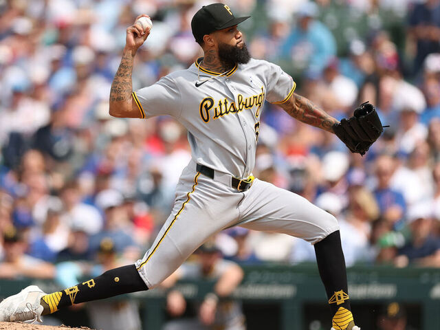 CHICAGO, ILLINOIS - JUNE 15: Dennis Santana #60 of the Pittsburgh Pirates delivers a pitch during the ninth inning against the Chicago Cubs at Wrigley Field on June 15, 2025 in Chicago, Illinois.