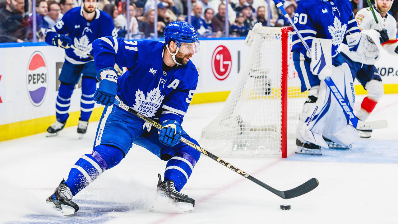 TORONTO, ON - May 18: Toronto Maple Leafs center John Tavares (91) is seen with the puck during the first period of game 7 of the Eastern Conference Playoffs between the Florida Panthers and Toronto Maple Leafs on May 18, 2025, at Scotiabank Arena in Toronto, ON.