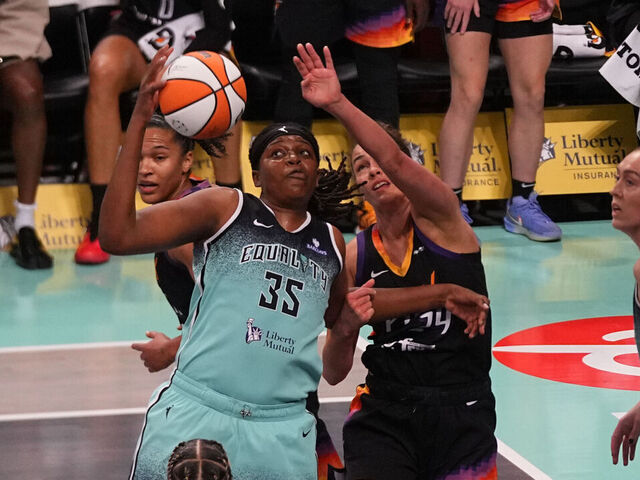 BROOKLYN, NY - JUNE 19: New York Liberty Center Jonquel Jones (35) and Phoenix Mercury Forward Kathrun Westbeld (24) battle for the ball during the first half of the Women National Basketball Association game between the Phoenix Mercury and the New York Liberty on June 19, 2025, at the Barclays Center in Brooklyn, NY.