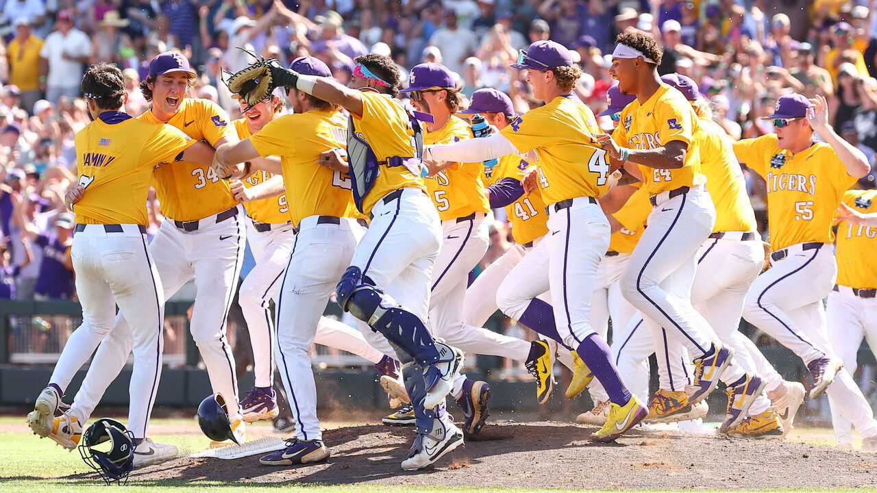 OMAHA, NEBRASKA - JUNE 22: The LSU Tigers celebrate with Chase Shores #34 of the LSU Tigers after defeating the Coastal Carolina Chanticleers in game two of the Division I Baseball Championship held at Charles Schwab Field on June 22, 2025 in Omaha, Nebraska.