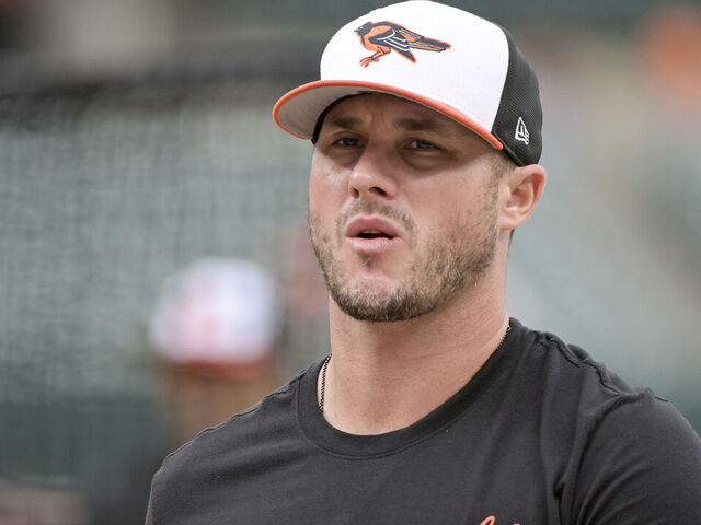 BALTIMORE, MD - OCTOBER 02: Baltimore Orioles catcher James McCann (27) walks off the field after batting practice prior to the Wild Card Playoff game between the Kansas City Royals versus the Baltimore Orioles on October 2, 2024 at Oriole Park at Camden Yards in Baltimore, MD.