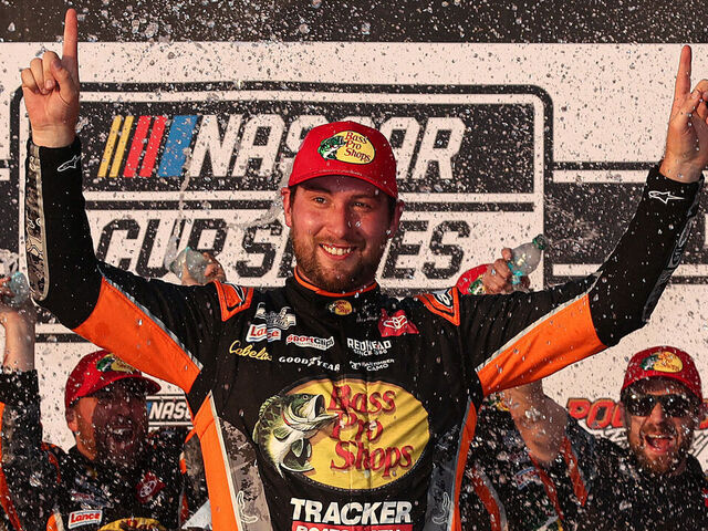 LONG POND, PENNSYLVANIA - JUNE 22: Chase Briscoe, driver of the #19 Bass Pro Shops Toyota, celebrates in victory lane after winning the NASCAR Cup Series The Great American Getaway 400 at Pocono Raceway on June 22, 2025 in Long Pond, Pennsylvania.