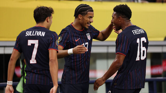 ARLINGTON, TEXAS - JUNE 22: Malik Tillman of USA celebrates after scoring a goal to make it 1-0 with Quinn Sullivan and Alex Freeman during the CONCACAF Gold Cup Group D match between United States and Haiti at AT&T Stadium on June 22, 2025 in Arlington, Texas.