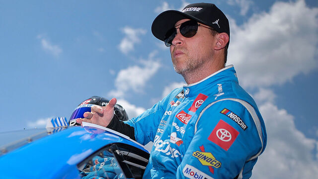 LONG POND, PENNSYLVANIA - JUNE 21: Denny Hamlin, driver of the #11 Progressive Toyota, enters his car during practice for the NASCAR Cup Series The Great American Getaway 400 at Pocono Raceway on June 21, 2025 in Long Pond, Pennsylvania.
