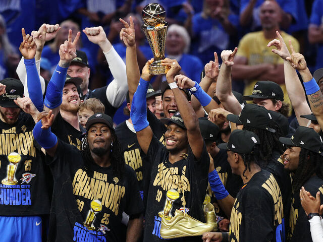 OKLAHOMA CITY, OKLAHOMA - JUNE 22: Shai Gilgeous-Alexander #2 of the Oklahoma City Thunder celebrates with the Bill Russell NBA Finals Most Valuable Player trophy after defeating the Indiana Pacers 103-91 in Game Seven of the 2025 NBA Finals at Paycom Center on June 22, 2025 in Oklahoma City, Oklahoma.
