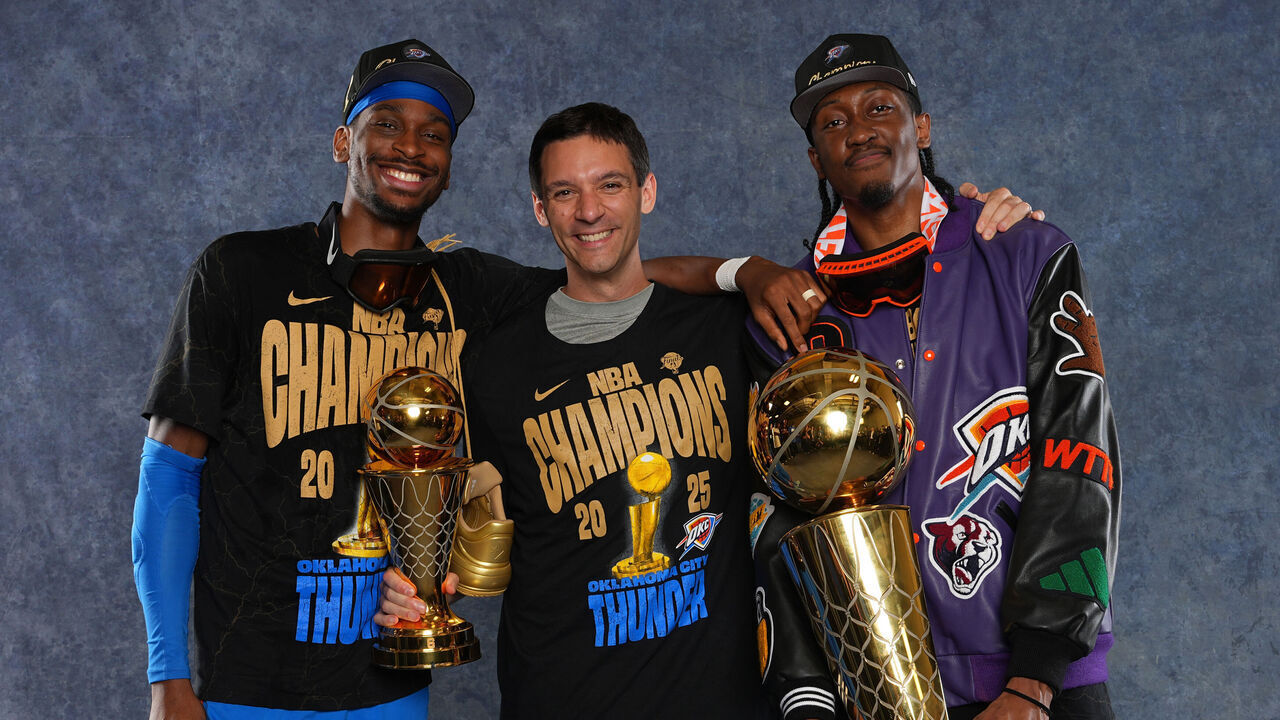 OKLAHOMA CITY, OK - JUNE 22: Shai Gilgeous-Alexander #2, Head Coach Mark Daigneault of the Oklahoma City Thunder, and Jalen Williams #8 of the Oklahoma City Thunder poses for a portrait with the Bill Russell 2025 Finals MVP Award and the Larry O'Brien Championship Trophy after winning Game Seven of the 2025 NBA Finals on June 22, 2025 at Paycom Center in Oklahoma City, Oklahoma. Mandatory Copyright Notice: Copyright 2025 NBAE