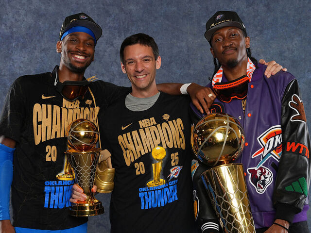 OKLAHOMA CITY, OK - JUNE 22: Shai Gilgeous-Alexander #2, Head Coach Mark Daigneault of the Oklahoma City Thunder, and Jalen Williams #8 of the Oklahoma City Thunder poses for a portrait with the Bill Russell 2025 Finals MVP Award and the Larry O'Brien Championship Trophy after winning Game Seven of the 2025 NBA Finals on June 22, 2025 at Paycom Center in Oklahoma City, Oklahoma. Mandatory Copyright Notice: Copyright 2025 NBAE