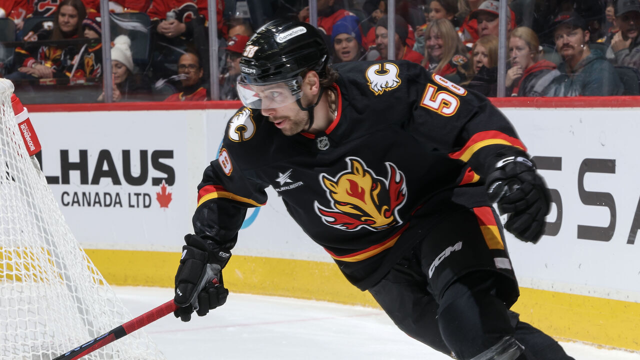 CALGARY, AB - NOVEMBER 23: Justin Kirkland #58 of the Calgary Flames skates against the Minnesota Wild at Scotiabank Saddledome on November 23, 2024 in Calgary, Alberta, Canada.