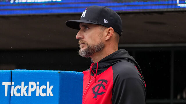 MINNEAPOLIS, MN - MAY 21: Manager Rocco Baldelli #5 of the Minnesota Twins looks on during the ninth inning against the Cleveland Guardians during game two of a doubleheader on May 21, 2025 at Target Field in Minneapolis, Minnesota.
