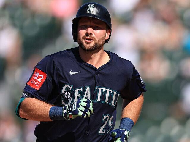 CHICAGO, ILLINOIS - JUNE 21: Cal Raleigh #29 of the Seattle Mariners celebrates hitting a home run against the Chicago Cubs at Wrigley Field on June 21, 2025 in Chicago, Illinois.