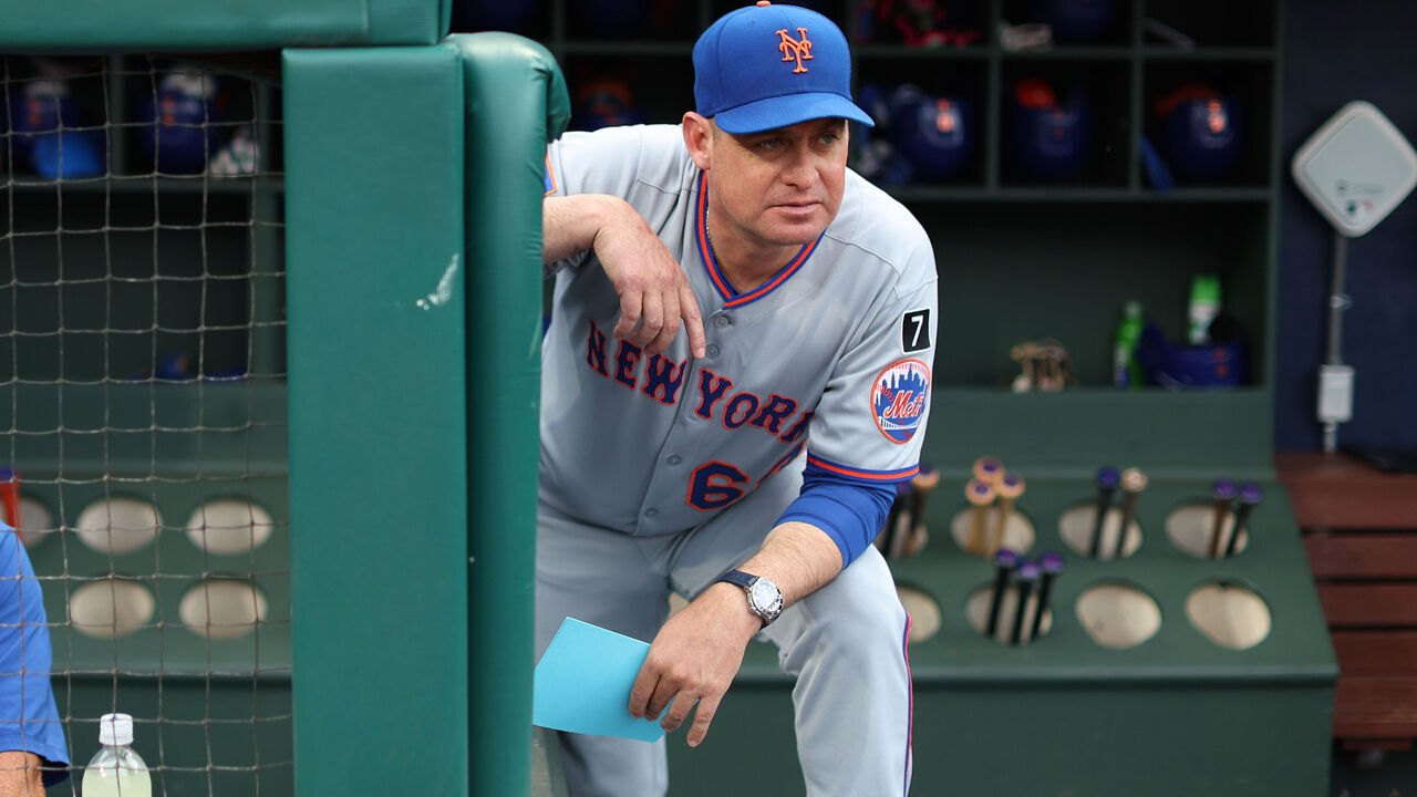 PHILADELPHIA, PA - JUNE 20: Manager Carlos Mendoza #64 of the New York Mets looks on from the dugout prior to the game between the New York Mets and the Philadelphia Phillies at Citizens Bank Park on Friday, June 20, 2025 in Philadelphia, Pennsylvania.