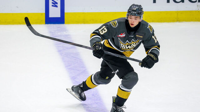 BRANDON, CANADA - SEPTEMBER 20: Roger McQueen #13 of the Brandon Wheat Kings skates during third period action against the Moose Jaw Warriors at Westoba Place on September 20, 2024 in Brandon, Canada.