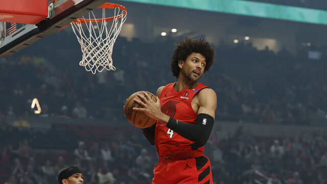 PORTLAND, OREGON - APRIL 06: Matisse Thybulle #4 of the Portland Trail Blazers controls a rebound during the first quarter against the San Antonio Spurs at the Moda Center on April 06, 2025 in Portland, Oregon.