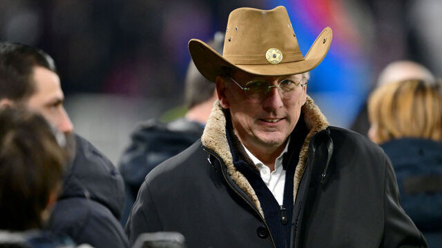 Olympique Lyonnais' (OL) President John Textor walks pitchside ahead of the French L1 football match between Olympique Lyonnais (OL) and Paris Saint-Germain (PSG) at the Parc Olympique Lyonnais in Decines-Charpieu, central-eastern France, on February 23, 2025.