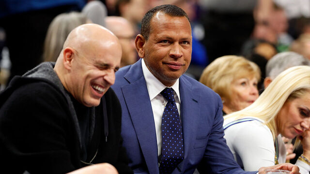 MINNEAPOLIS, MINNESOTA - DECEMBER 30: Co-owners Alex Rodriguez (R) and Marc Lore of the Minnesota Timberwolves interact in the second quarter against the Los Angeles Lakers at Target Center on December 30, 2023 in Minneapolis, Minnesota. The Timberwolves defeated the Lakers 108-106.