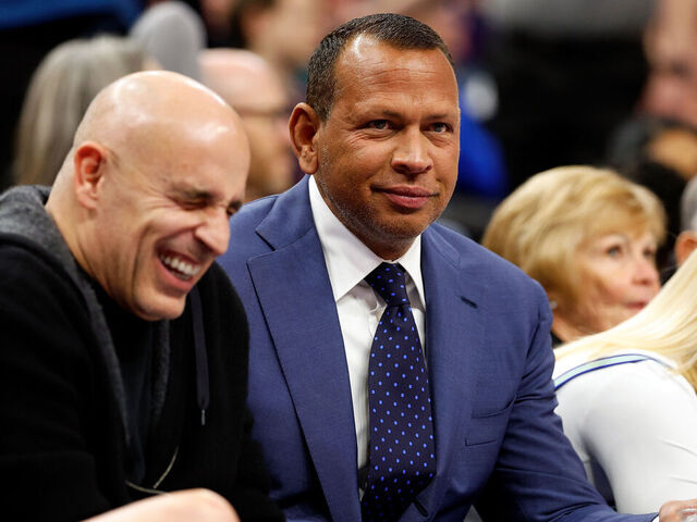 MINNEAPOLIS, MINNESOTA - DECEMBER 30: Co-owners Alex Rodriguez (R) and Marc Lore of the Minnesota Timberwolves interact in the second quarter against the Los Angeles Lakers at Target Center on December 30, 2023 in Minneapolis, Minnesota. The Timberwolves defeated the Lakers 108-106.