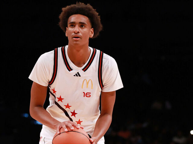 BROOKLYN, NY - APRIL 01: McDonalds High School All American Alijah Arenas (16) shoots a free throw against Darius Adams (20) during the McDonalds Boys High School All American Game on April 1, 2025, at the Barclays Center in Brooklyn, New York.