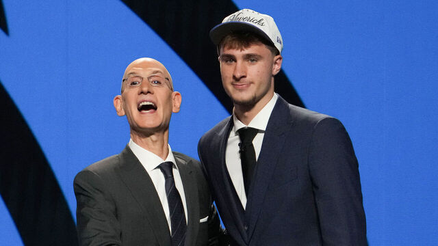 US basketball player Cooper Flagg (R) shakes hands with NBA Commissioner Adam Silver after being selected first overall by the Dallas Mavericks during the opening round of the 2025 NBA Draft at Barclays Center in Brooklyn, New York, on June 25, 2025. Versatile US college teen star Cooper Flagg was selected first overall in the NBA draft on June 25 by the Dallas Mavericks, where he'll join a star-laden team already touted as a playoff threat next season. Flagg, a consensus pick as the top US college player as a freshman at Duke University last season, is the second-youngest player taken first overall.