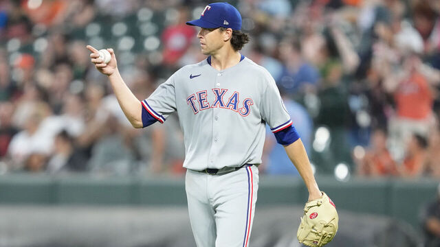 BALTIMORE, MD - JUNE 25: Jacob deGrom #48 of the Texas Rangers gestures in the eighth inning after his no-hit bid is broken during a game against the Baltimore Orioles at Oriole Park at Camden Yards on June 24, 2025 in Baltimore, Maryland.