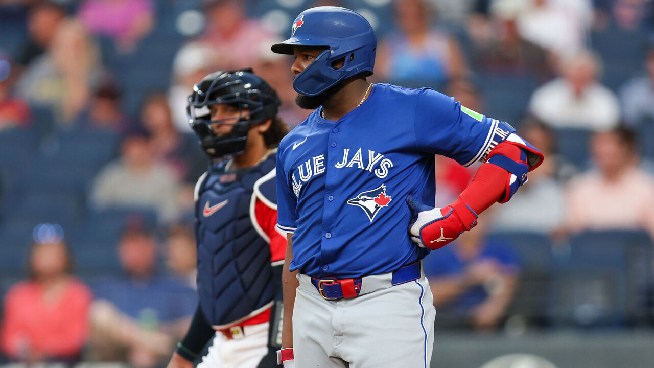 CLEVELAND, OH - JUNE 25: Toronto Blue Jays first baseman Vladimir Guerrero Jr. (27) reacts after being hit by a pitch during the eighth inning of the Major League Baseball game between the Toronto Blue Jays and Cleveland Guardians on June 25, 2025, at Progressive Field in Cleveland, OH.