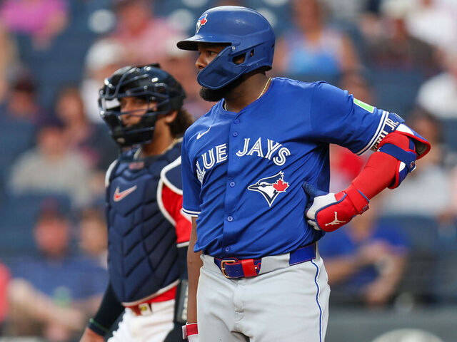 CLEVELAND, OH - JUNE 25: Toronto Blue Jays first baseman Vladimir Guerrero Jr. (27) reacts after being hit by a pitch during the eighth inning of the Major League Baseball game between the Toronto Blue Jays and Cleveland Guardians on June 25, 2025, at Progressive Field in Cleveland, OH.