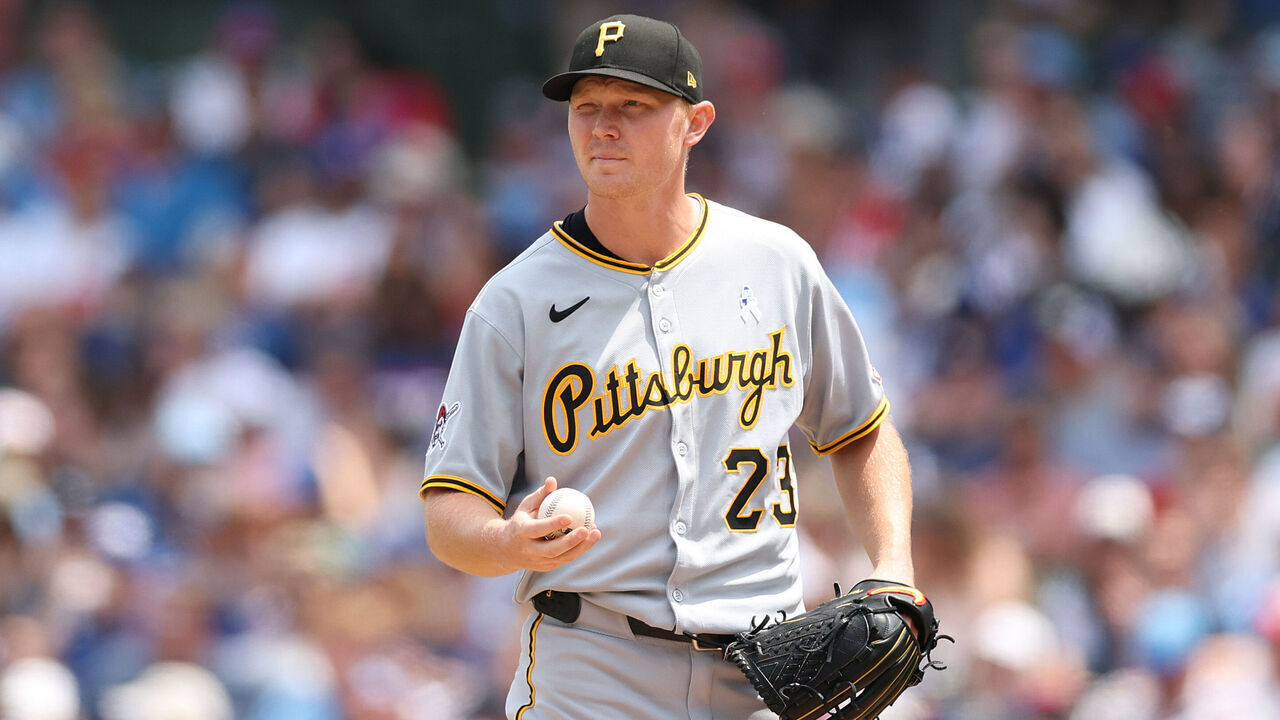 CHICAGO, ILLINOIS - JUNE 15: Mitch Keller #23 of the Pittsburgh Pirates reacts after allowing a run against the Chicago Cubs at Wrigley Field on June 15, 2025 in Chicago, Illinois.
