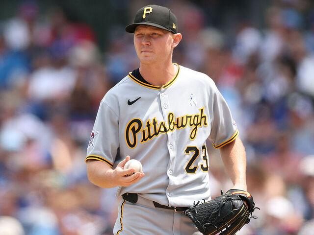 CHICAGO, ILLINOIS - JUNE 15: Mitch Keller #23 of the Pittsburgh Pirates reacts after allowing a run against the Chicago Cubs at Wrigley Field on June 15, 2025 in Chicago, Illinois.