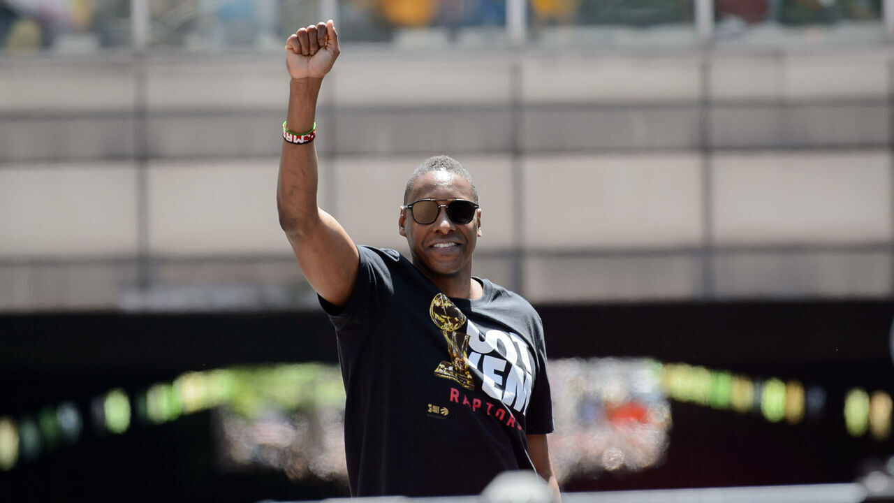 TORONTO, ON - JUNE 17: Toroto Raptors president Masai Ujiri holds his fist in the air during the Toronto Raptors Championship parade on June 13, 2019 in Toronto, ON, Canada.